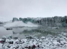Tourists scramble to avoid wave caused by a glacier collapse