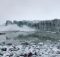 Tourists scramble to avoid wave caused by a glacier collapse