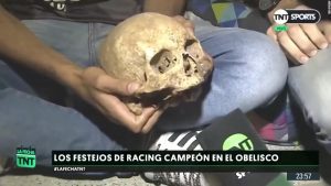 Football fan celebrates win with grandad’s skull